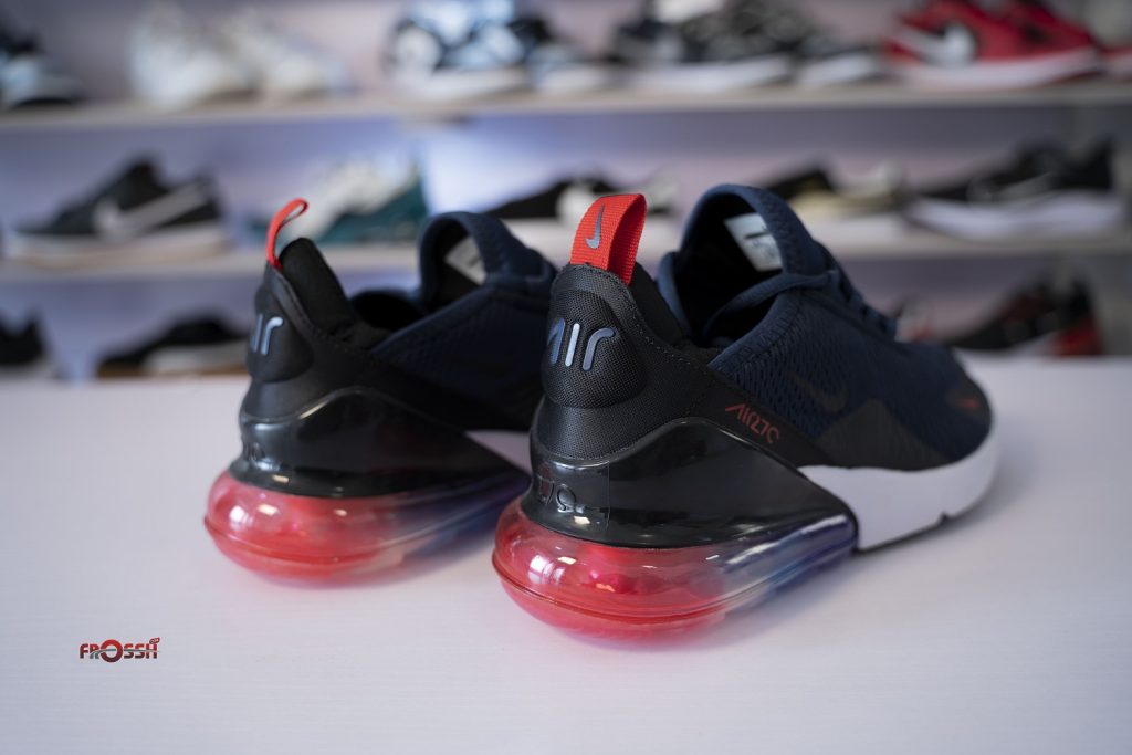 black nike trainers pink tick